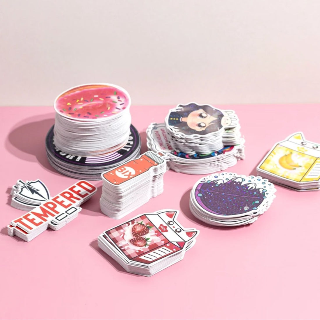 Stacks of round die-cut kiss-cut stickers, easy to peel