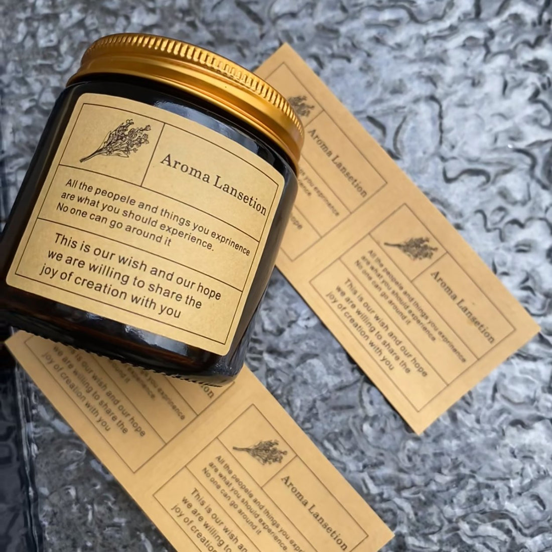 Kraft paper labels on amber aroma candle jars — Pakvel