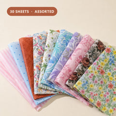 Fan of 30 assorted printed tissue paper sheets — florals, stripes, dots and patterns