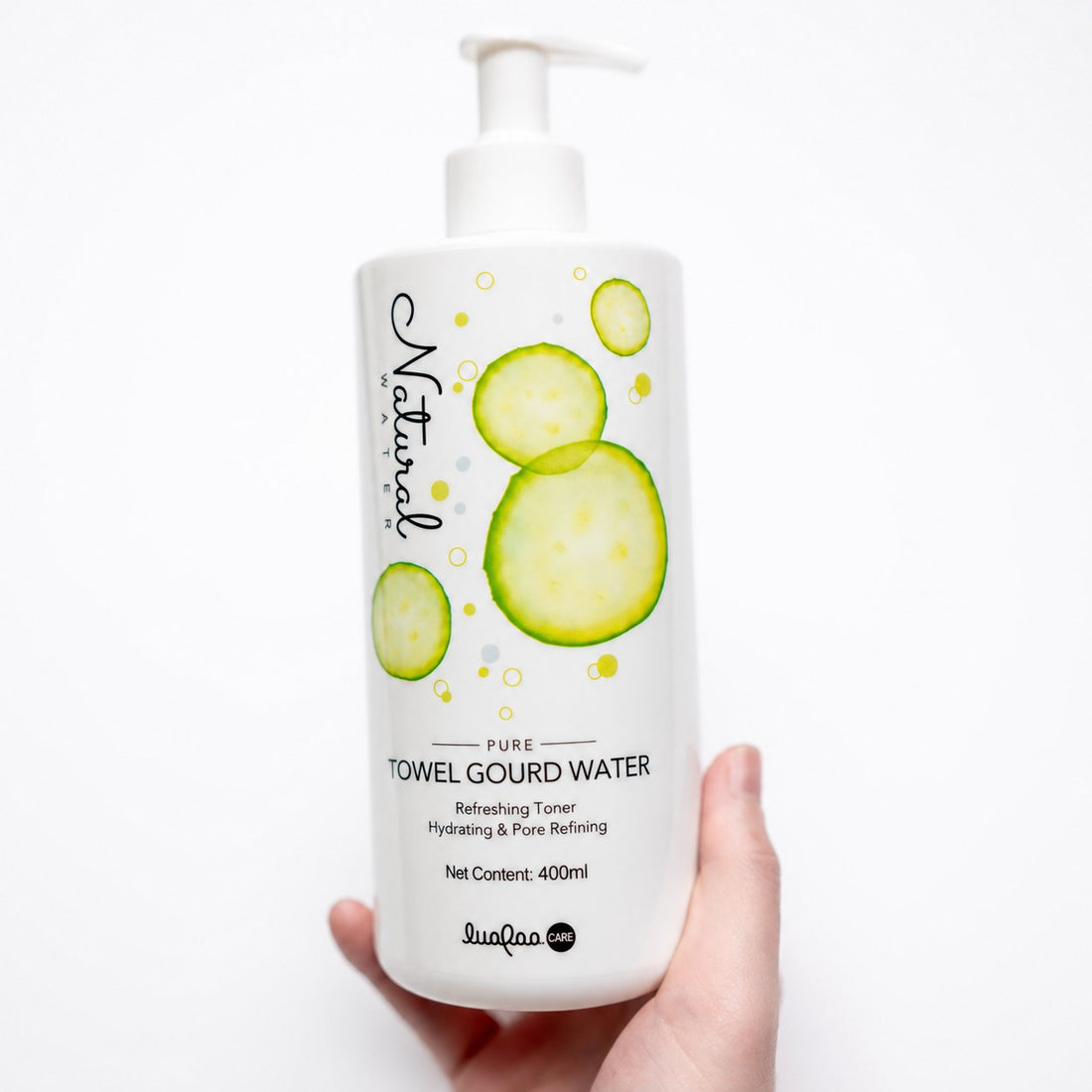 Transparent clear label on a white skincare pump bottle, waterproof product sticker