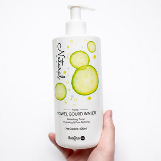 Transparent clear label on a white skincare pump bottle, waterproof product sticker