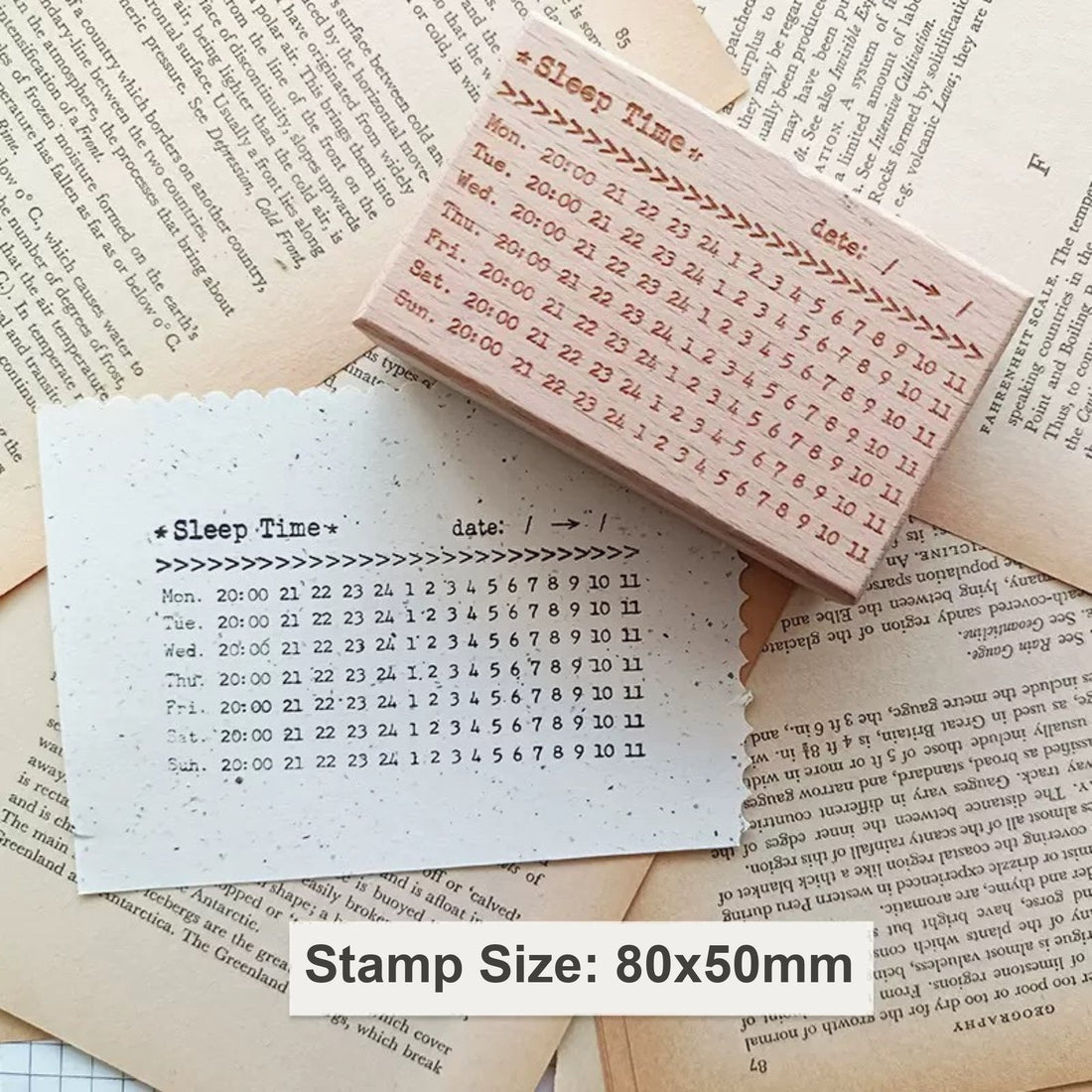 Custom rectangular rubber stamp, 80×50 mm, beside its stamped impression