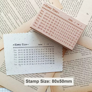 Custom rectangular rubber stamp, 80×50 mm, beside its stamped impression