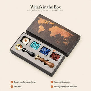 What is in the box: a brass wax seal stamp, a wax spoon, a tea light and sealing wax beads