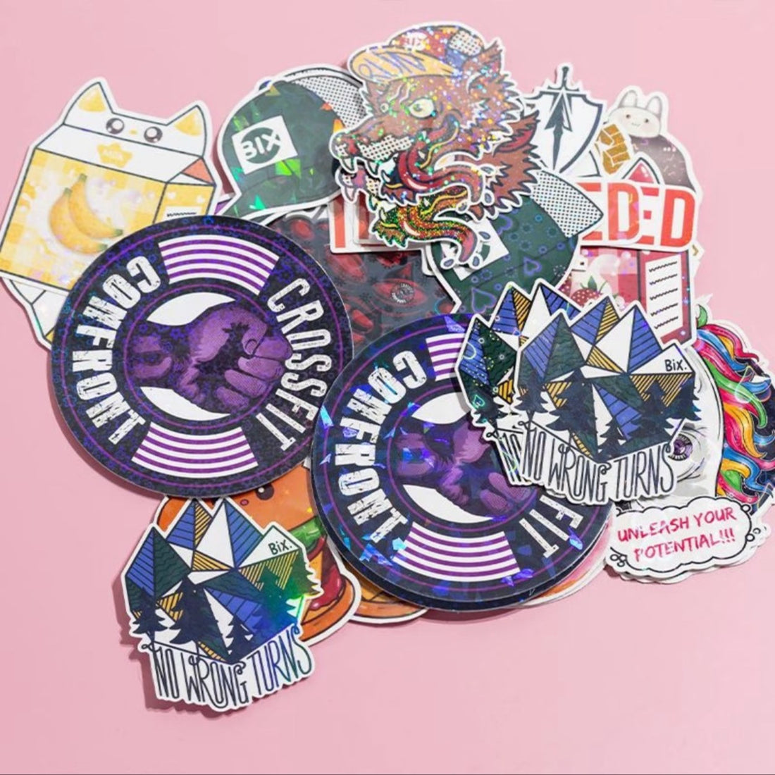 A fan of custom die-cut stickers in assorted shapes and finishes