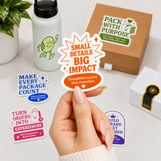 Custom die-cut brand stickers with a kraft mailer box and water bottle