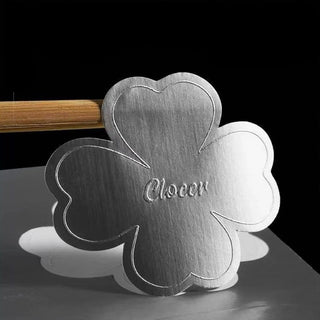 Embossed clover on matte silver metallic stock — Pakvel