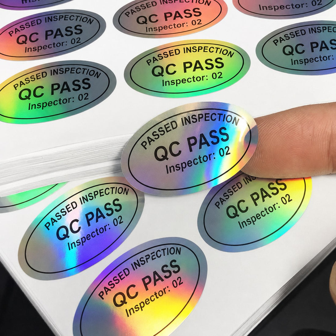 Oval holographic QC-pass stickers, custom die-cut — Pakvel