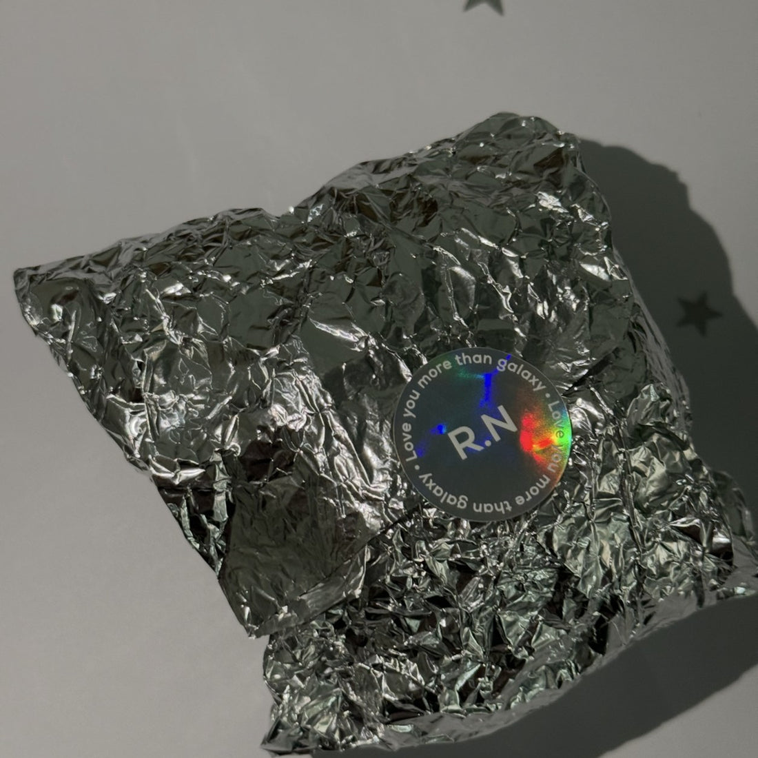 Close-up of a holographic sticker rainbow shimmer — Pakvel