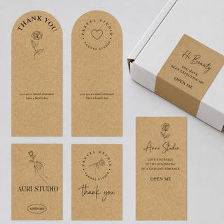 Flat-lay of kraft thank-you tags and cards — Pakvel