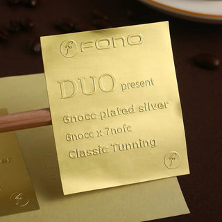 Gold metallic rectangle label with printed lettering, brushed metallic foil paper sticker