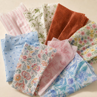 Assorted Pakvel printed tissue paper samples — florals, botanicals, dots and stripes