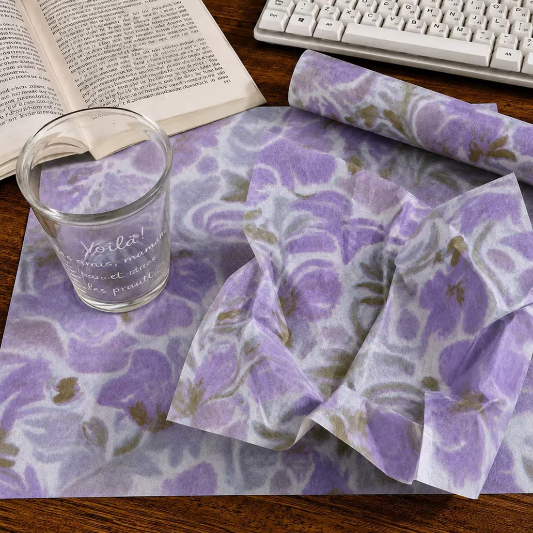Lilac patterned tissue paper detail on a desk
